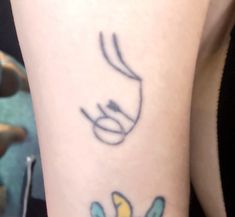 a close up of a person's arm with a tattoo design on the wrist