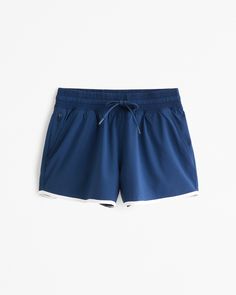 Women's YPB motionTEK High Rise Lined Workout Short | Women's Active | Abercrombie.com Sporty Athletic Shorts Mid-thigh With Medium Support, Blue Athleisure Athletic Shorts Mid-thigh Length, Blue 4-way Stretch Athletic Shorts For Athleisure, Blue High-stretch 2-in-1 Athletic Shorts, Sporty 4-way Stretch Blue Athletic Shorts, Workout Shorts Women, 2024 Wardrobe, Workout Short, American Clothing