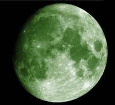 the green moon is seen in the dark sky