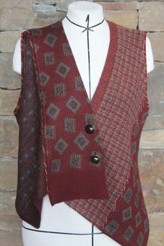 a mannequin wearing a sweater vest with buttons on the front and back side