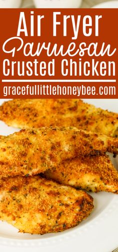 air fryer parmesan crusted chicken on a white plate with text overlay