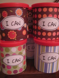 three colorful cups with i can labels on them