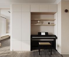 a piano is in the corner of a room with shelving and shelves on either side