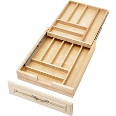 an open drawer with two compartments on it