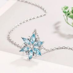 Silver With Clear And Light Blue Cubic Zirconia Snowflake Necklace Brand New Boutique Item! Blue Snowflake Sterling Silver Necklace, Light Blue Jewelry, Light Blue Necklace, Fancy Accessories, Snowflake Necklace, Light Blue Dresses, Necklace Brands, Fancy Jewelry, Blue Jewelry