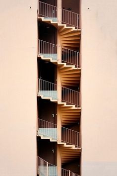 an apartment building with balconies and balconyes