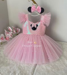 Hello☺️Our dresses are handmade products.Personalized design is available🌸you can let me know by sending a message.Our dresses use cotton lining and have a hidden zipper at the back.Dense layers of tulle are used on the skirts of our dresses and they are fluffy dresses,A hair accessory is also sent as a gift along with the dress🎁We deliver your order within 4 business days with fast shipping💖Thank you for choosing us and we wish you pleasant shopping.⭐️⭐️⭐️⭐️⭐️ Minnie Mouse Costume Pink, Pink Minnie Mouse Party Dress, Fluffy Dresses, Pink Minnie Mouse Dress, Minnie Mouse Princess Dress For Dress-up, Costume Photoshoot, Playful Cotton Minnie Mouse Dress, Playful Minnie Mouse Dress-up Dress, Minnie Mouse Costume