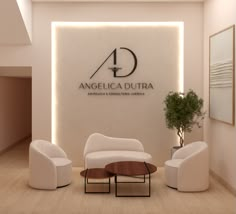 the interior of an office with white chairs and tables in front of a sign that reads angelica dura