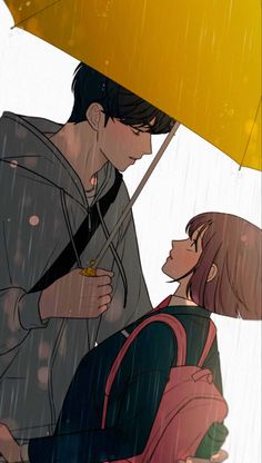 two people standing under an umbrella in the rain