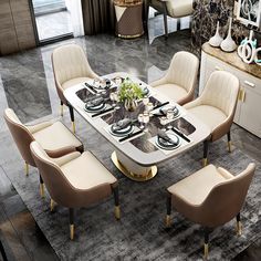 a dining room table with chairs around it