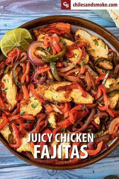 chicken fajitas with peppers and onions in a skillet