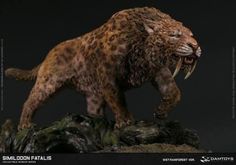 a statue of a leopard with its mouth open and it's teeth wide open