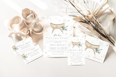 the wedding stationery is laid out on top of each other