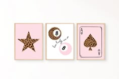 three cards with different designs on them, one in pink and the other in leopard print