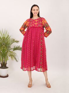 Rani Pink Pure Cotton Handwoven Jamdani Dress Spring Cotton Silk Dress With Chikankari Embroidery, Festive Spring Dresses In Cotton Silk, Long Sleeve Cotton Silk Dress With Chikankari Embroidery, Bohemian Pink Chanderi Dress, Festive Cotton Dress With Woven Motifs, Cotton Handloom Dress With Straight Kurta, Traditional Chanderi Tunic Dresses, Festive Cotton Dress With Chikankari Embroidery, Spring Cotton Handloom Dresses