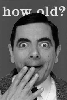 a black and white photo of a man making a funny face with the words how old?