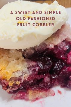 a close up of a piece of fruit cobbler on a plate with the words, a sweet and simple old fashioned fruit cobbler