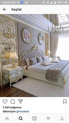 a bed room with a neatly made bed and a chandelier hanging from the ceiling