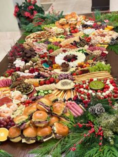 a table filled with lots of different types of food