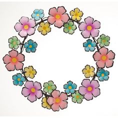 an image of a flower wreath made out of plastic flowers on a white background with copy space in the middle