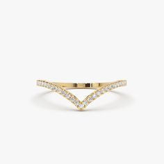 a yellow gold ring with white diamonds