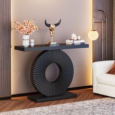 a living room with a couch, table and vases on top of the tables