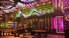 the interior of a bar with colorful lights and tables in front of it, all lit up