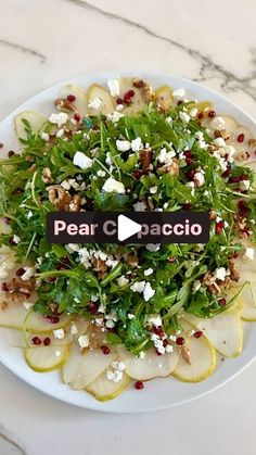 pear and arugula salad on a white plate