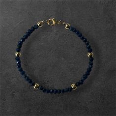 This bracelet is hand crafted with dark lapis lazuli and 14 karat gold filled beads. The clasp is 14 karat gold filled and the bracelet is set on fine wire. The bracelets are shower and swim proof, they retain their gold finish. Colored Gems, Lapis Lazuli, Gold Finish, Gold Filled, Jewelry Bracelets, Hand Crafted, Beaded Bracelets, Accessory Gift, Gems