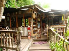 a wooden porch with stairs leading up to it