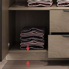 the closet is full of folded towels and other things to use for storage in it