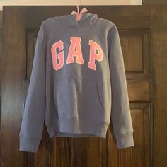 Brand New Never Worn Gap Hoodie Cheap Multicolor Gap Tops, Pink Cotton Hoodie By Gap, Pink Gap Sweatshirt For Winter, Gap Pink Winter Hoodie, Gap Pink Long Sleeve Hoodie, Gap Long Sleeve Tops With Drawstring Hood, Gap Long Sleeve Tops With Adjustable Hood, Gap Crew Neck Hoodie For Winter, Gap Hoodie With Adjustable Hood