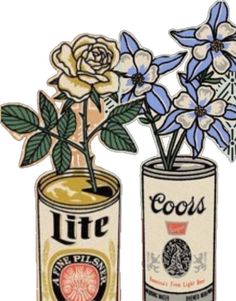 two cans with flowers in them sitting next to each other