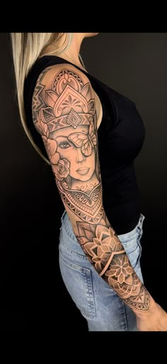 a woman with a tattoo on her arm