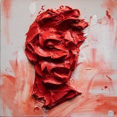 an abstract painting with red paint on it