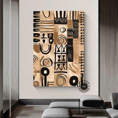 an abstract painting hangs on the wall in a living room