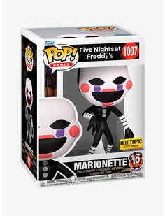 the pop vinyl figure is in its box and it's black with red eyes