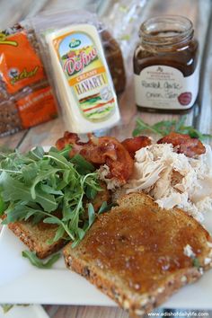 the meal is prepared and ready to be eaten on the table with other ingredients in the background