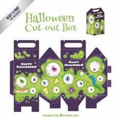 halloween cut - out box with green eyes and monster's head on the front