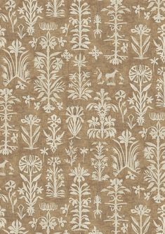 a brown and white floral pattern on fabric