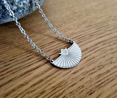 This beautiful dainty necklace features an Art Deco fan shaped pendant that has been etched with a geometric pattern. The pendant is 15mm x 25mm in size. The chain is available in 40cm or 45cm in length. All components are made from stainless steel and plated gold or rhodium. Art Deco Fan, Retro Minimalist, Geometric Vintage, Art Deco Pendant, Art Deco Necklace, Brass Jewelry, Quartz Pendant, Delicate Necklace, Dainty Necklace