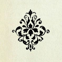 a black and white drawing of an ornate design