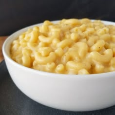 a white bowl filled with macaroni and cheese