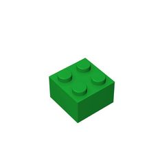 a green lego block sitting on top of a white surface