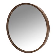 a round mirror is shown against a white background and has a wooden frame around it