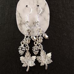 Handmade Dangling Fall Maple Leaf Earrings. Features A Double Acorn And Pineapple Charms As Well Senior Project, Fall Earrings, Leaf Jewelry, Earrings Color, Leaf Earrings, Maple Leaf, Autumn Leaves, Piercings, Pineapple