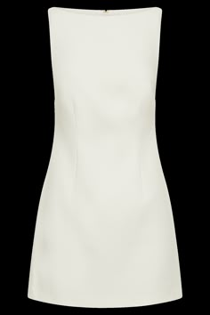 (Not) all business.ANGELA is a sleeveless mini dress with a clean boat neckline and A-line skirt. Crisp and modern, the front features contoured seam lines for a fresh, fitted look. The dress closes with an invisible zip to keep the silhouette smooth, sleek, and sexy. A beautiful blend of stylish and classy, this dress is a versatile wardrobe essential. Accessorise with an oversized blazer, clean earrings, and elegant heels like Geneva Square Diamante Mules. This dress is considered a Micro Mini White Business Casual Outfit, Creme Outfit, Elegant White Mini Dress With Buttons, Luxury Chic White Mini Dress, White Graduation Dress, Chic White A-line Mini Dress, Elegant White Structured Mini Dress, Structured White Mini Dress, White Dresses Graduation