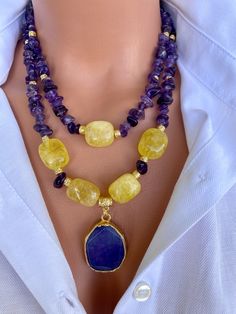 Raw Amethyst and Citrine Layered Necklace Set with Agate Pendant This elegant necklace set is a great gift for yourself and your loved ones. Made from natural crystal beads. All metal ornaments are gold plated and won't get darker in time! FREE SHIPPING - All orders get shipped within 1-2 business days. - 5-10 days of delivery time Returns are allowed 14 days after the delivery, however, the cost of delivery lies on the buyer. For more bracelets and necklaces!: https://finecrystalsdesign.etsy.co Yellow Gemstone Beaded Necklaces As Gift, Yellow Gemstone Beaded Necklace For Gifts, Yellow Amethyst Jewelry Gift, Yellow Double Strand Jewelry As Gift, Yellow Double Strand Jewelry For Gift, Amethyst And Citrine, Unique Statement Necklace, Ocean Inspired Jewelry, Metal Ornaments