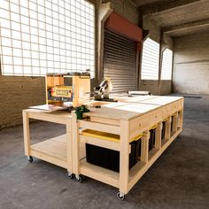 a workbench made out of plywood and wood