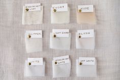 nine pieces of cloth with labels on them that read ivory, white, and linen